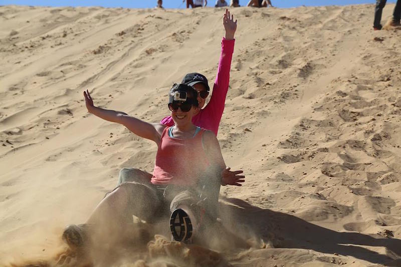 Sandboarding in the Negev Desert should be in every Israel travel guide book